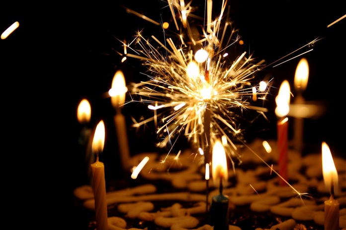 Birthday cake with candles by Nikhita Singal