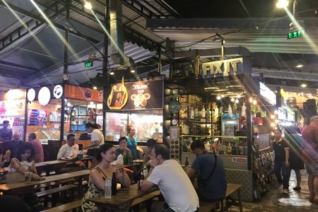 people sitting at a food court