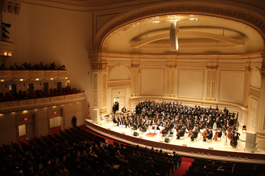 Image of orchestra in Carnegie Hall, NYC, for the USA-Japan Goodwill Concert view from box seats