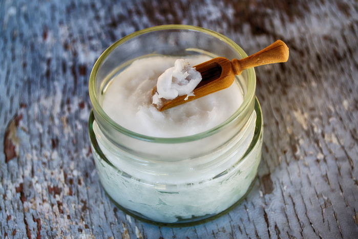 clear glass container with coconut oil