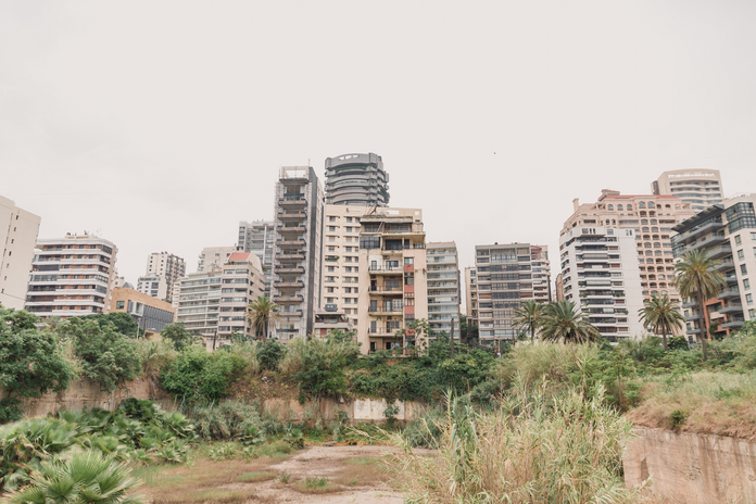 A photo of Beirut, Lebanon, facing the edge of the city from a field