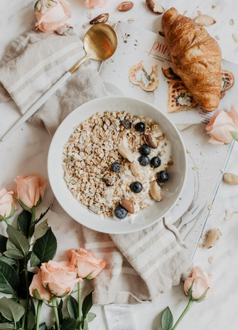 oatmeal with blueberries on beautiful table by Ellieelien