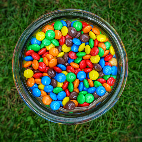 m&m's in bowl on grass