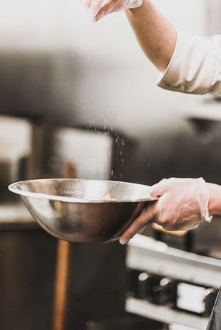 cooking with salt by Bank Phrom from Unsplash