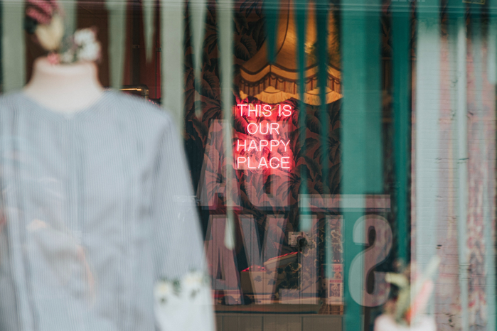This is our happy place neon sign by Dan Smedley on Unsplash
