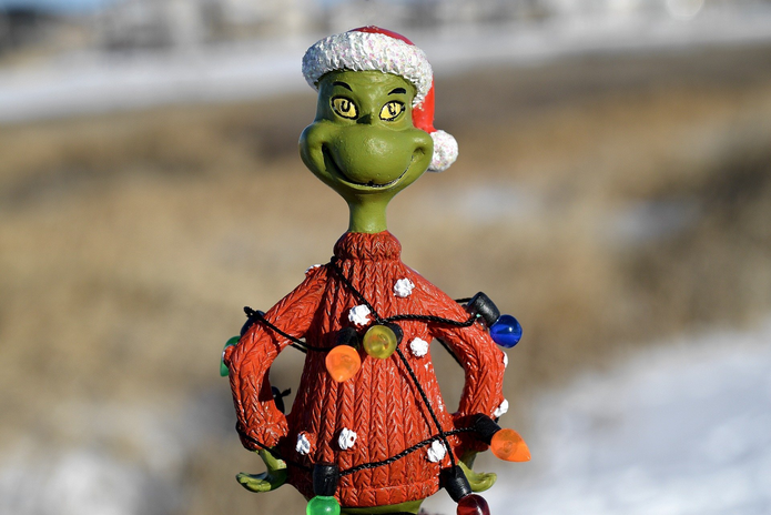Grinch figurine with lights on it
