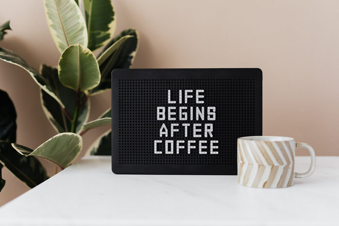 life begins after coffee sign by Karolina Grabowska