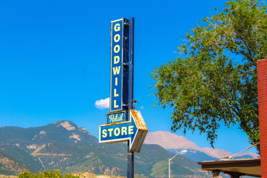 A commercial sign displaying \"Goodwill\"