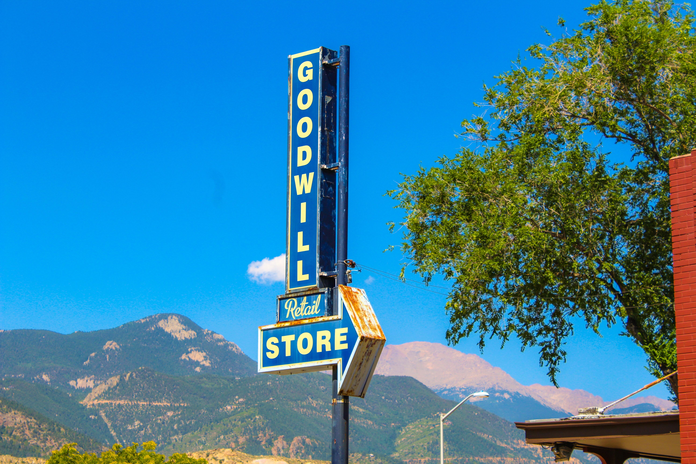 A commercial sign displaying \"Goodwill\"