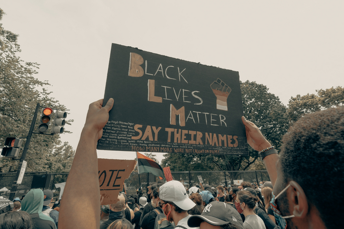 Black Lives Matter protest poster by Clay Banks from Unsplash