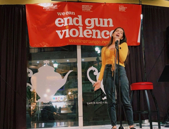 Juliana Simone Carrasco singing at we can end gun violence.