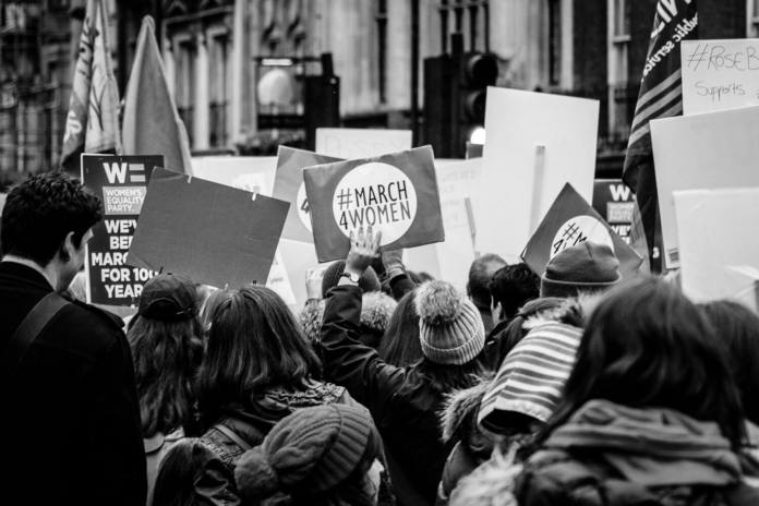 Black and white women\'s march photo