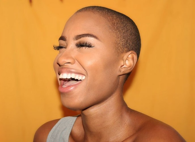 woman laughing with clear skin