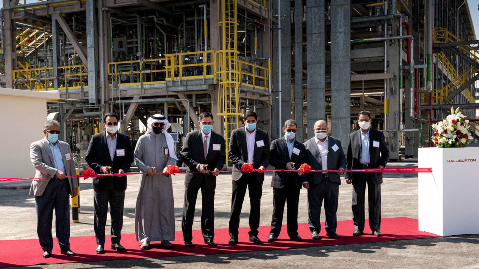 Halliburton formally opens its chemical reaction plant with a ribbon cutting
