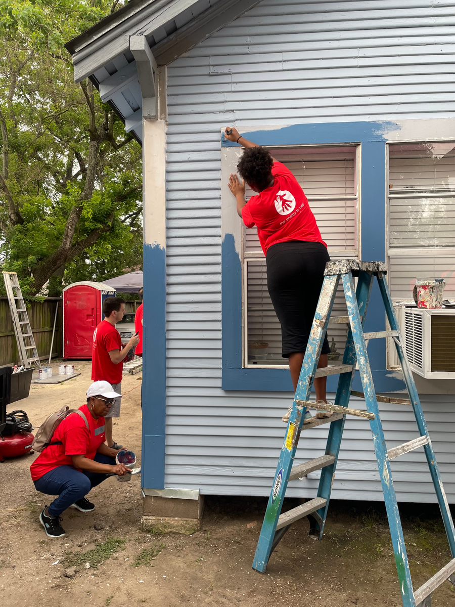 Painting a home at Rebuilding Together 2023