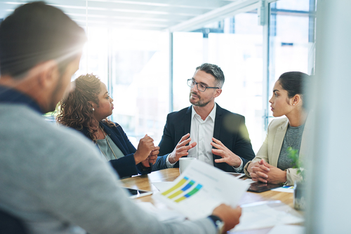 man speak in meeting